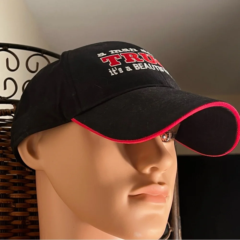 A one size fits all Black ball Cap 